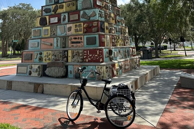 Stop at the Monument of States on the E-Bike tour at Kissimmee Lakefront Park.